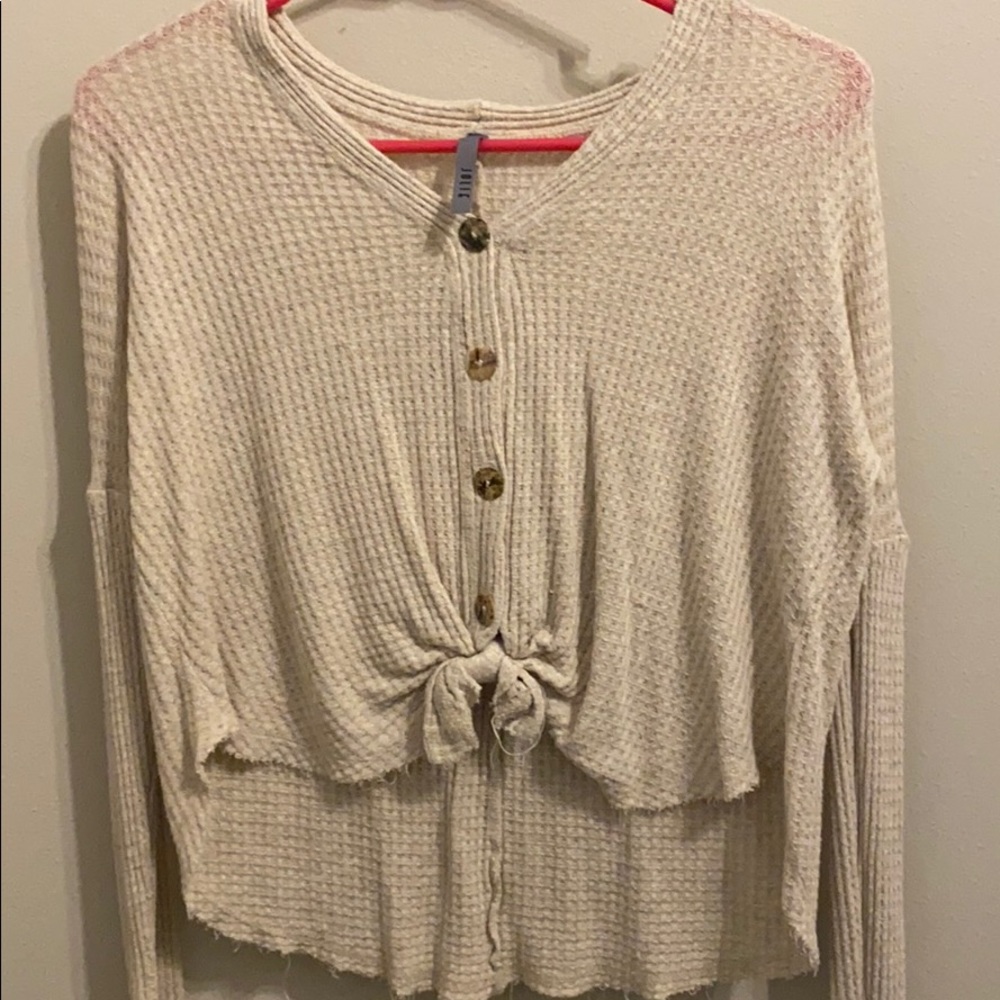A loose fitted long sleeve shirt